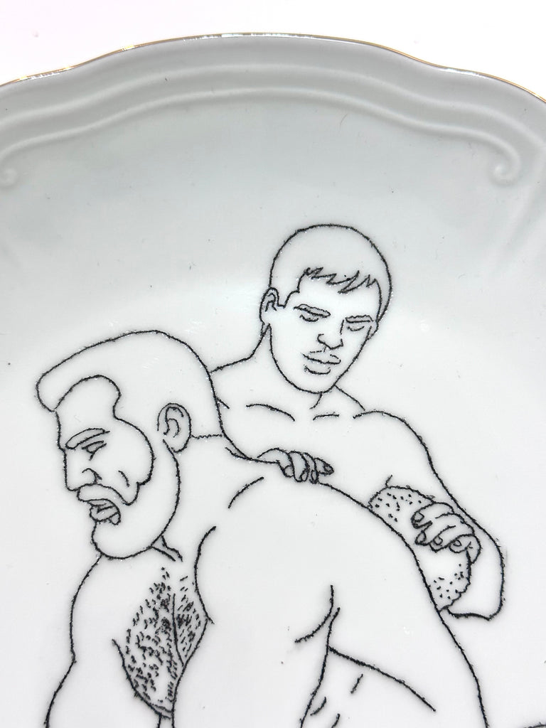 Omri Danino Porcelain Plate engraved with a drawing of two nude male models, one older hairy bearded man with full frontal un-erect penis, and another younger man behind him - detail - faces