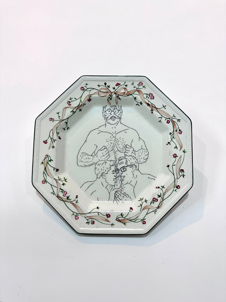 Omri Danino Porcelain Plate engraved with a drawing of gay sex threesome in black on white, hairy chested bearded man is being fellated by two men