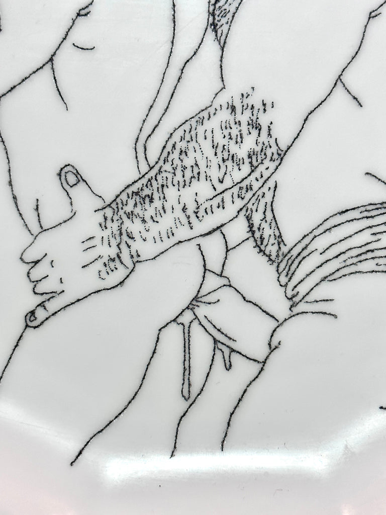 Omri Danino Porcelain Plate engraved with a drawing of two men during intercourse in black on white - detail of erection and gay intercourse