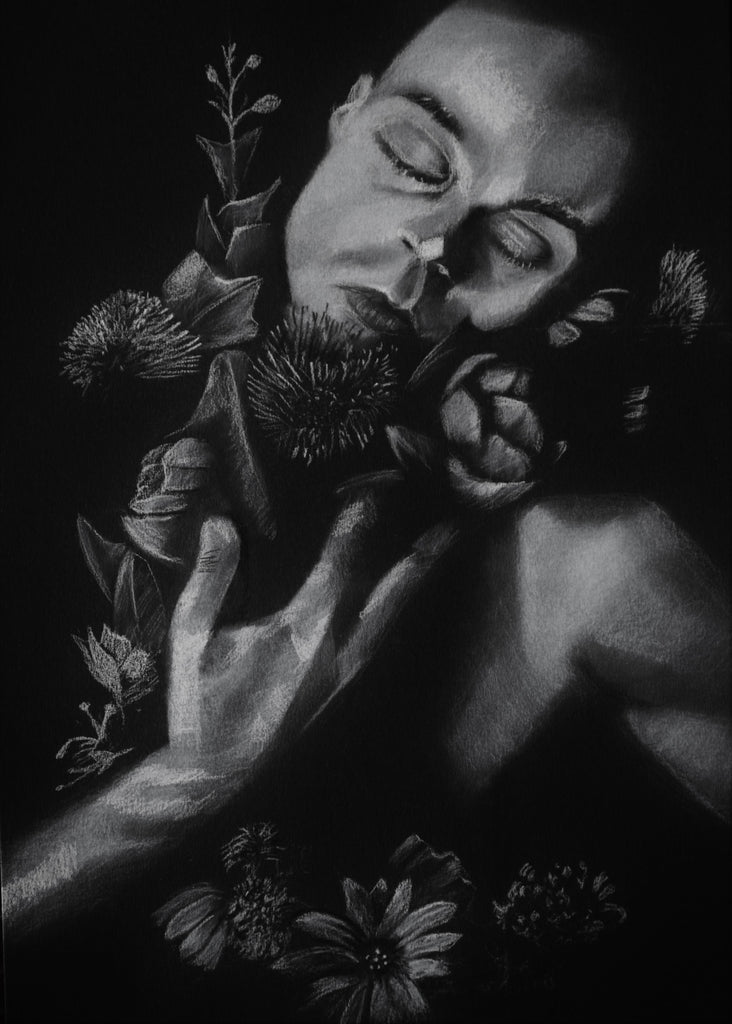 Art by Chen Tuby - Jan - White pastel on black paper - young man holding flowers and leaves with a shut-eyed longing face