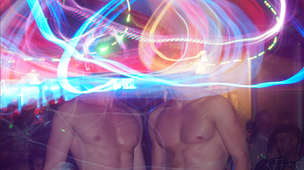 Digital photography by Ben Hantkant - long exposure photo in a nightclub with two topless headless male models